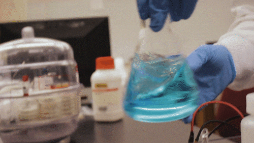 Scientist Mixing Chemical GIF
