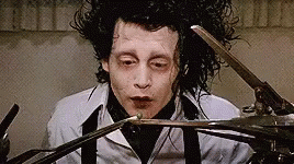 Edward Scissorhands Struggles To Hold Food GIF