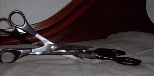 Scissors Snipping Each Other Stop Motion GIF