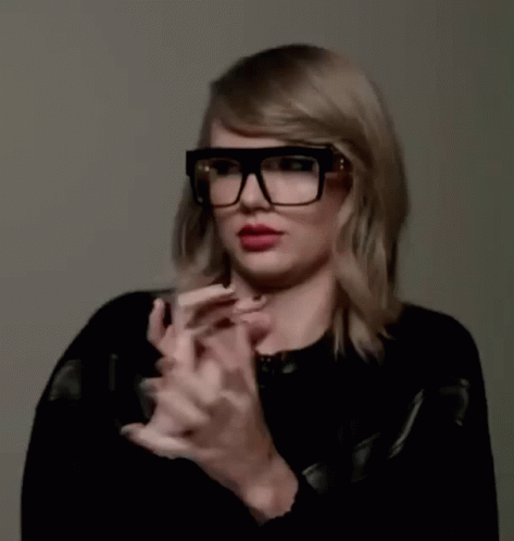 Taylor Swift Finger Scissors Gesture GIF