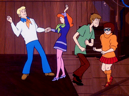 Scooby Doo And His Friends Are Dancing In A Cartoon GIF