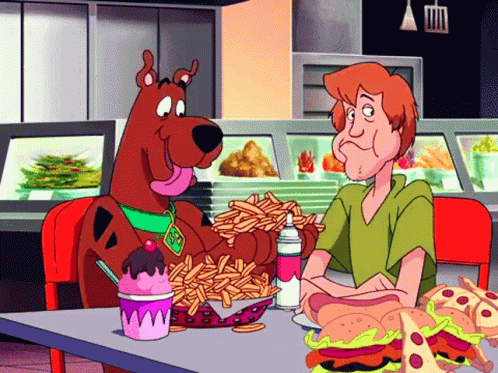 Scooby Doo And Shaggy Are Sitting At A Table Eating French Fries And Hamburgers GIF
