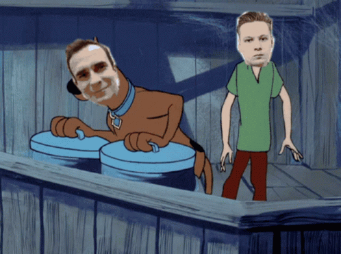 Scooby Doo And Shaggy Are Standing Next To Each Other In A Cartoon GIF