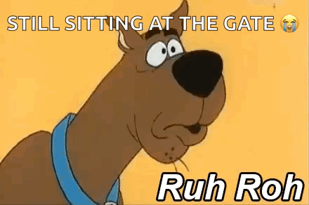 Scooby Doo Is Sitting At The Gate In A Cartoon . GIF