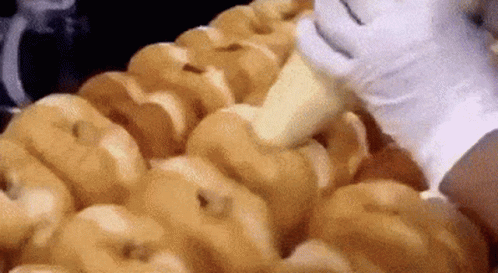 Scoop Of Ice Cream Poured Into Glass With Little Puff Sign GIF