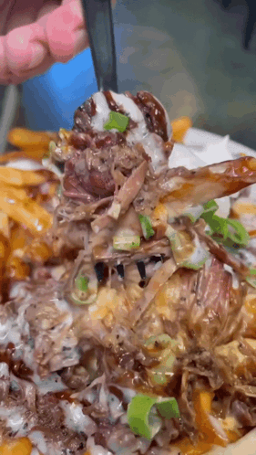 Scooping Cheesy Brisket GIF