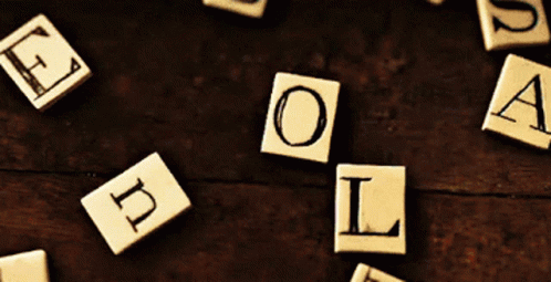 Scrabble Tiles With Letters E O L A GIF