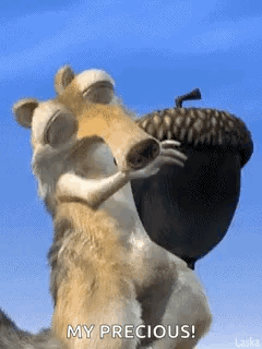 Scrat Rubbing Precious Acorn GIF