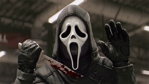 Scream Mask Person Holding Bloody Knife