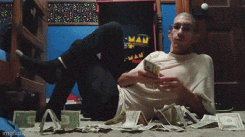 Scrooge Kissing Money GIF