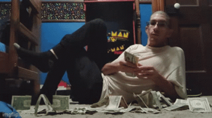 Scrooge Kissing Money GIF