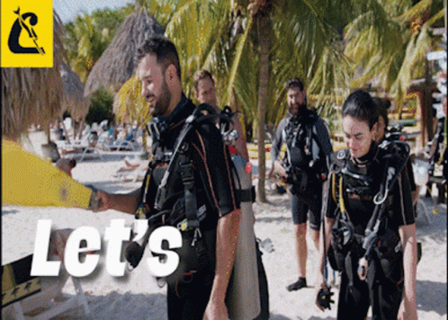 Scuba Divers on Beach with Lets