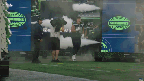 Seahawks Player Walking On Field GIF
