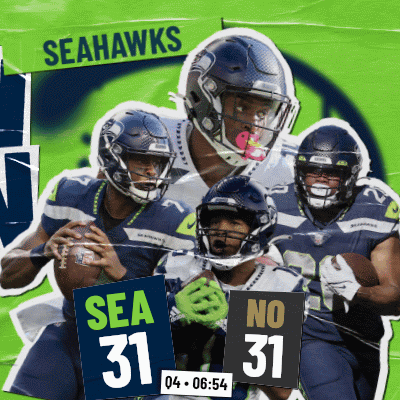 seahawks players holding signs that say sea 31
