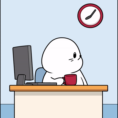 Seal Sitting at Desk with Computer
