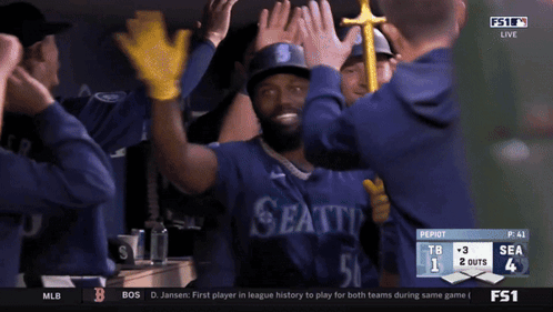 Seattle Baseball Players High Five in Dugout