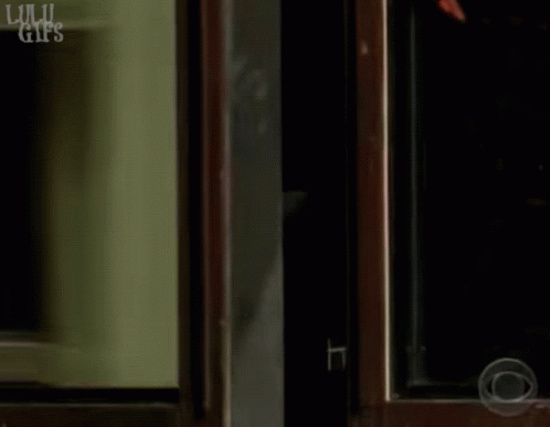 Secret Santa Holding Many Gifts GIF