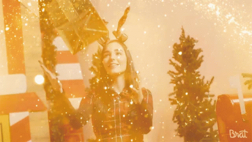 Secret Santa With Friends Holding Gift GIF