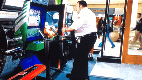 Security Guard by Arcade Machine Saying Arcade