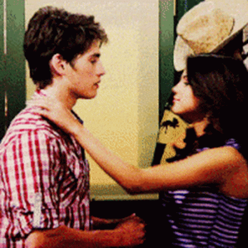 Selena And Gregg Kiss On Cheek GIF