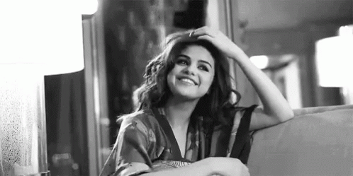 Selena Gomez Demure Smile GIF