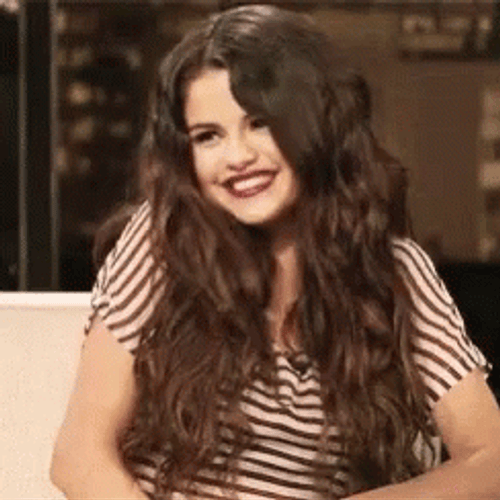 Selena Gomez Happy And Flattered GIF