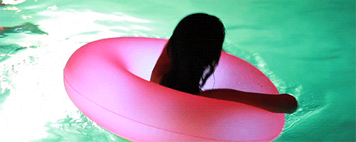 Selena Gomez Spinning On Pool GIF