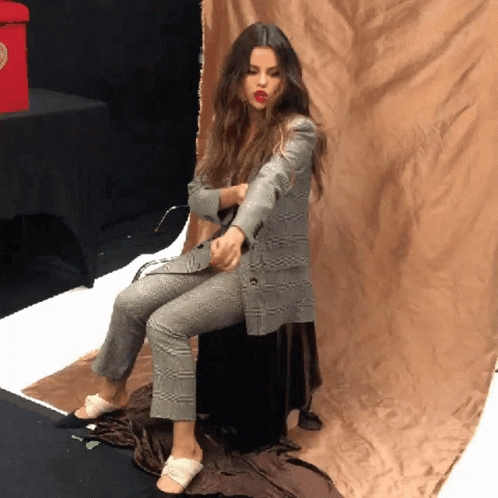 Selena Gomez Straight Arm Pulldown GIF