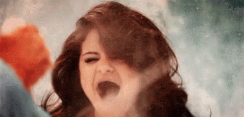Selena Laughing Toothless Meme GIF