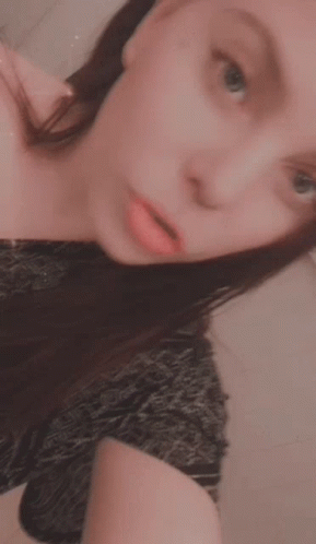 Lady With Tattoo Selfie GIF