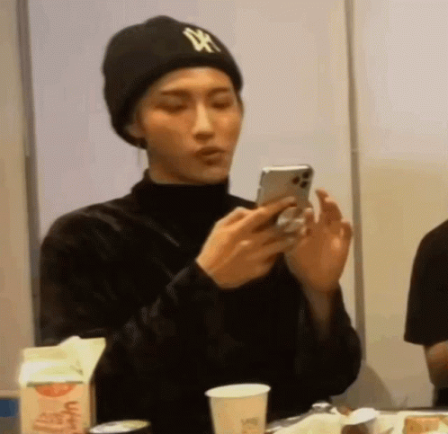 Seonghwa Ateez Scrolling In His Cellphone GIF