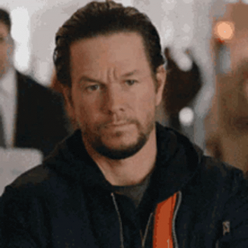 Serious Bearded Man in Black Jacket