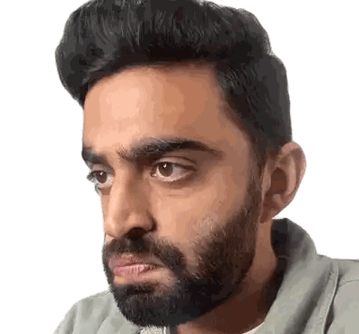 Serious Bearded Man Looking at Camera
