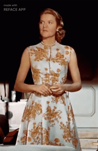 Serious Grace Kelly Looking Down GIF