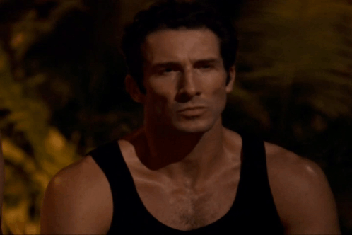 Serious Man in Black Tank Top