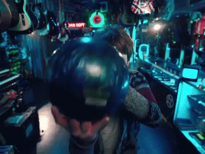 Serious Man In Bowling Alley GIF
