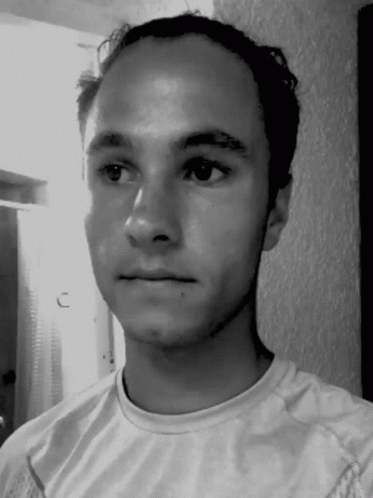 Serious Man in White Shirt