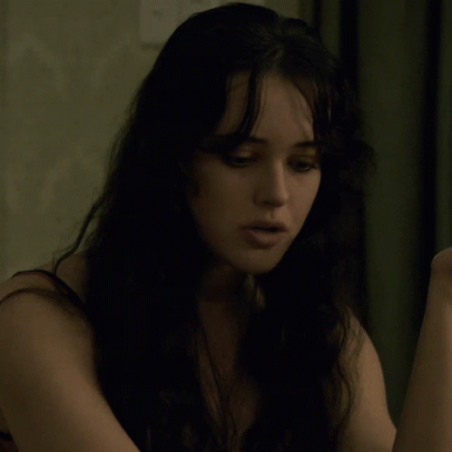 Serious Topless Woman Looking At Camera GIF