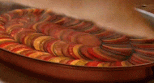 Serving Ratatouille Dish GIF