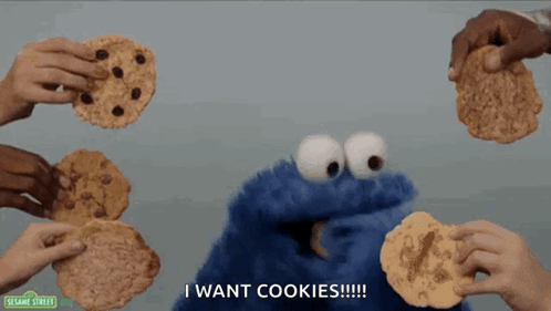 Sesame Street Cookie Monster Surrounded By People Holding Cookies GIF