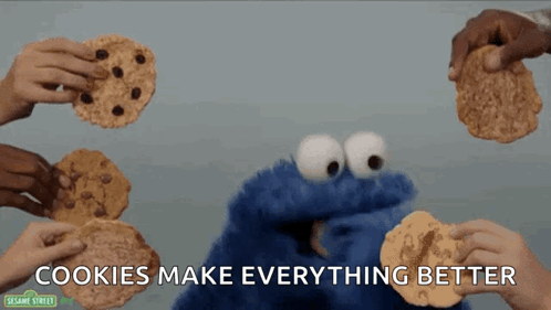 Sesame Street Cookie Monster Surrounded By People Holding Cookies And The Words Cookies Make Everything Better GIF