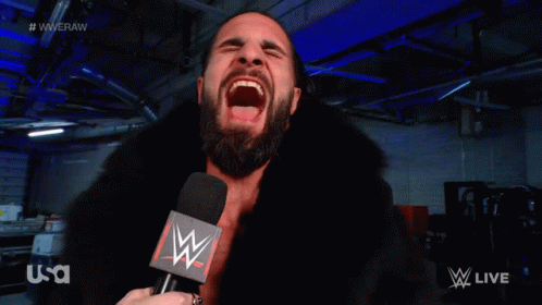 Seth Rollins Having A Bursting Laugh GIF