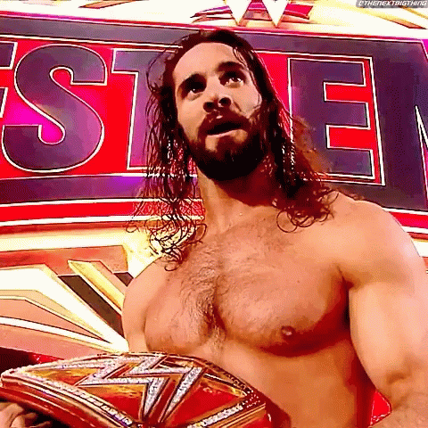 Seth Rollins Lifting Up The Belt GIF