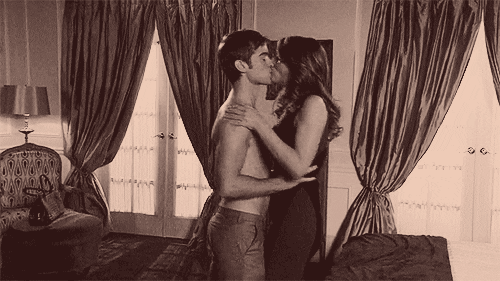 Sexy Kissing Pushed In Bed GIF