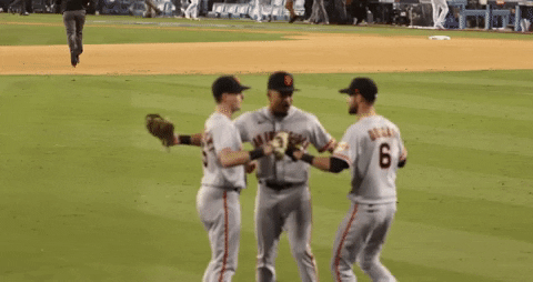 Sf Giants Players Hugging In The Field GIF