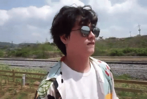 Shake Fist Man Wearing Shades GIF