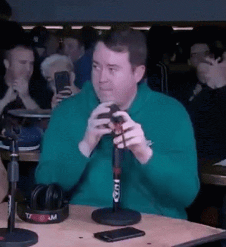Shane Gillis Fixing Mic Side Eye GIF