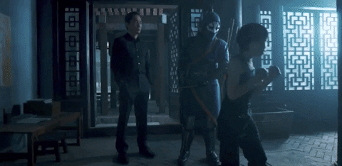 Shang Chi Punching Wood GIF