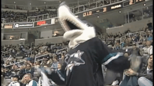Shark Mascot Dancing at Hockey Game