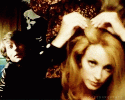 Sharon Tate Fixing Hair GIF